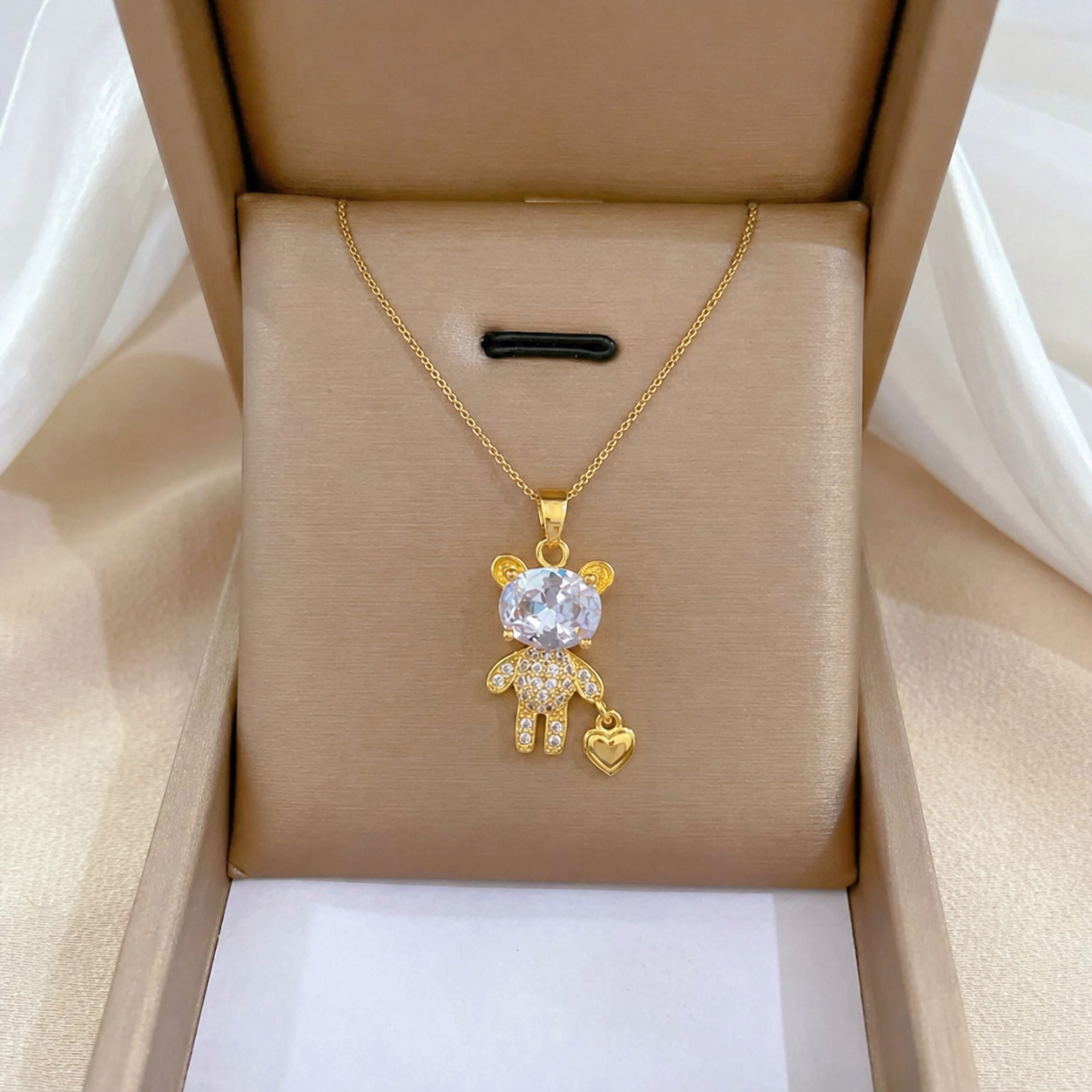 Gold teddy bear necklace