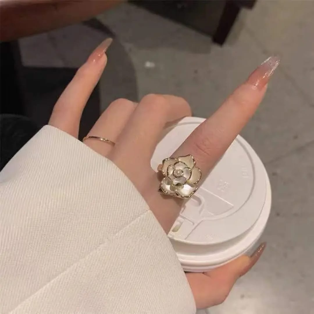 White Floral Spinner Ring