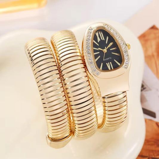 Gold Spiral Cuff Watch