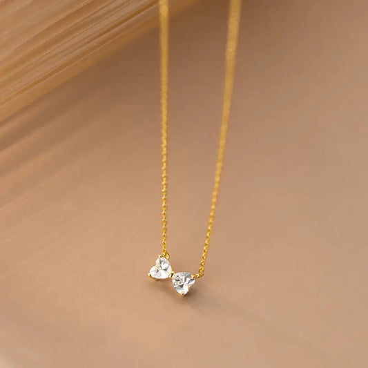 Tiny Crystal Bow Pendant