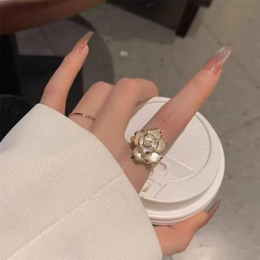 White Floral Spinner Ring